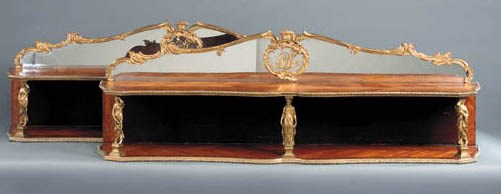 A pair of English ormolu-mounted kingwood and tulipwood book shelves