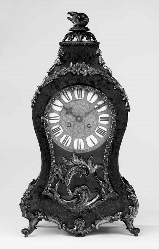 A French foliate cut brass inlaid mock red tortoiseshell  striking mantel clock, last quarter 19th century