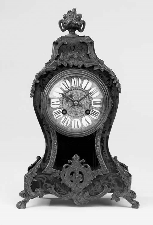A French foliate cut-brass inlaid mock red tortoiseshell striking mantel clock, last quarter 19th century