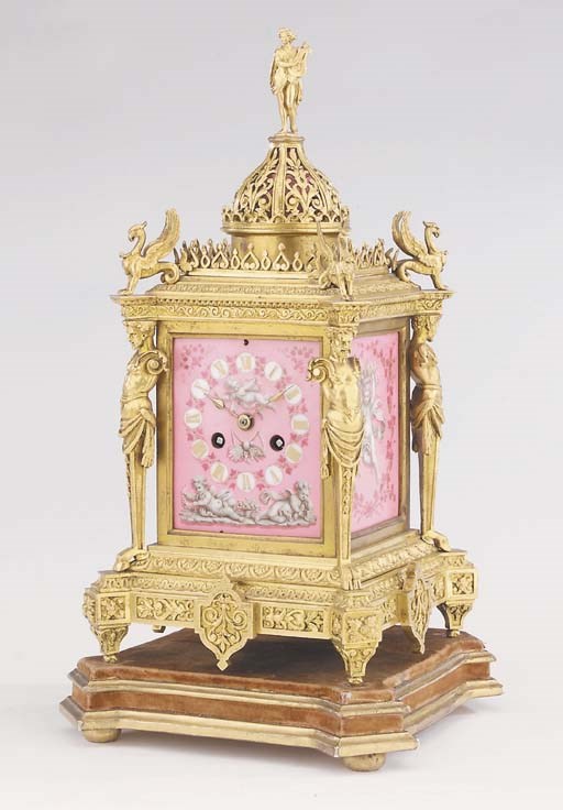 A French gilt-bronze and porcelain-mounted striking mantel clock, last quarter 19th century