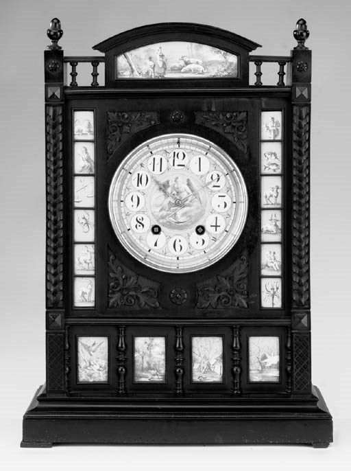 An Aesthetic Movement ebonised wood and porcelain-mounted striking mantel clock, late 19th century
