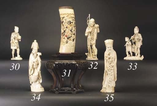 A large sectional ivory okimono of a trader