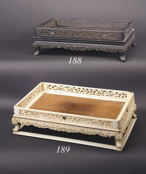 A Chinese Zitan rectangular reticulated stand