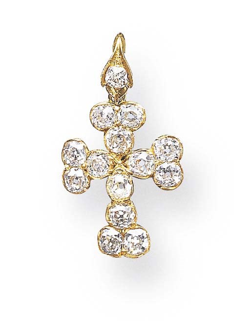 A DIAMOND AND GOLD CROSS PENDANT