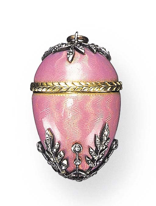 A DIAMOND, 14K GOLD AND ENAMEL EGG-SHAPED LOCKET, BY FABERGE