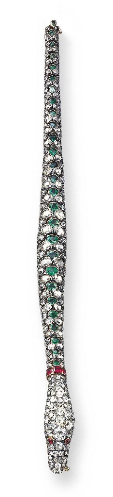 AN EXQUISITE ANTIQUE DIAMOND AND EMERALD SNAKE BRACELET