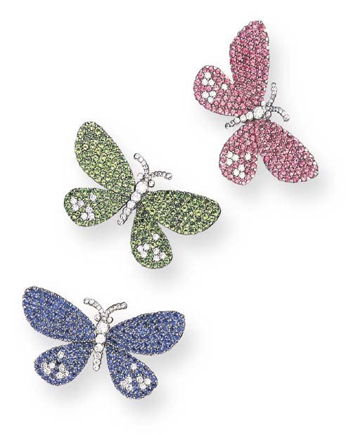 A SET OF THREE DIAMOND AND GEM-SET BUTTERFLY BROOCHES