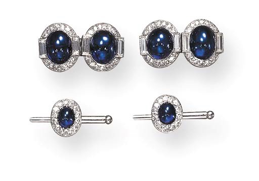 AN ART DECO CABOCHON SAPPHIRE AND DIAMOND DRESS-SET, BY CARTIER