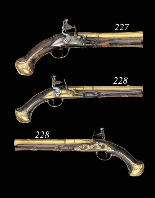 A Pair Of 20-Bore Flintlock Holster Pistols With Brass Barrels And Locks