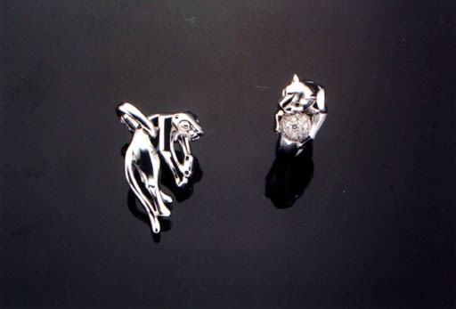 A SET OF 18K WHITE GOLD "PANTHER" JEWELLERY, BY CARTIER