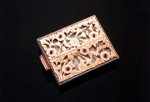 AN ELEGANT SILVER AND GOLD VANITY CASE, BY LACLOCHE