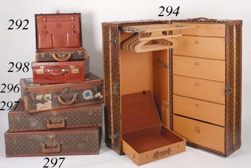A Louis Vuitton hard suitcase, covered in LV monogram canvas and bound in brass and leather, lock number H 5, the interior lined with beige leather and labelled Louis Vuitton Paris Nice 902437--31 1/2 x 20 1/2 x 8 1/2in. (80 x 52 x 22cm.), secound half of the 20th century, slight wear, and another, similar