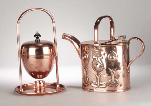 An Arts and Crafts copper watering can