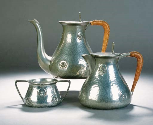 A Connell pewter three piece tea set