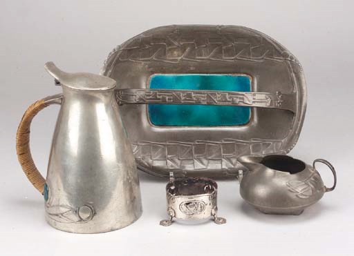 A Liberty Tudric Pewter and enamel lidded jug
