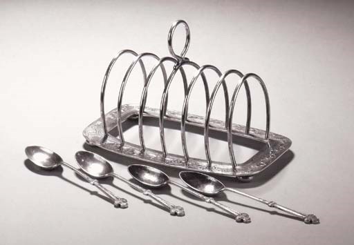 A Liberty and Co silver toast rack