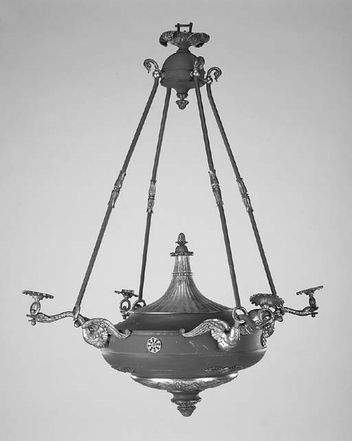 A French gilt metal and painted four light electrolier, first quarter 20th century