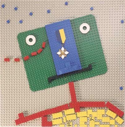 BAJ, Enrico. La Cravate ne vaut pas une Médaille. Genève: Rousseau Editeur, 1972. In-folio carré (400 x 400 mm.). En feuilles, sous double couverture illustrée, chemise à rabats et emboîtage orné d'une composition en légo d'Enrico BAJ, signée et numérotée.

ILLUSTRATIONS: Très nombreuses illustrations d'Enrico BAJ.

EDITION ORIGINALE. Tirage limité à 200 exemplaires, un des 35 numérotés contenant 2 collages originaux justifiés et signés.
Le livre est signé au justificatif par l'artiste, il est enrichi d'un collage original supplémentaire.