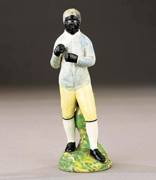 A pearlware figure of a negro pugilist