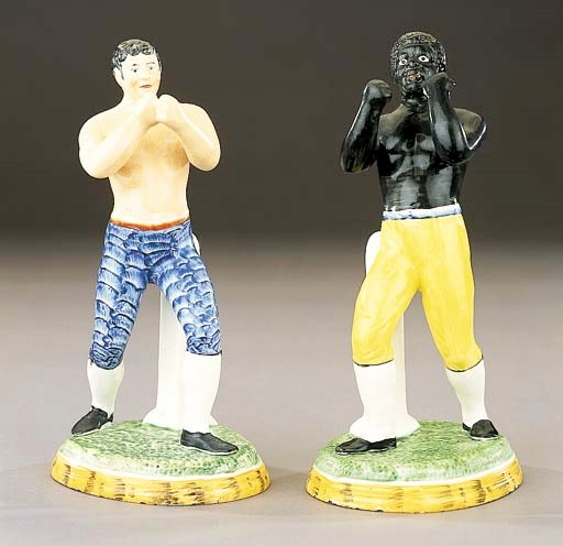 A pair of figures of the pugilists Tom Cribb and Tom Molyneux