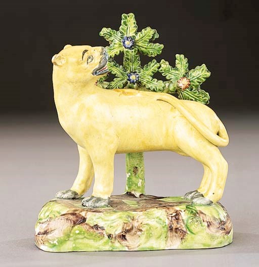 A pearlware model of a lioness