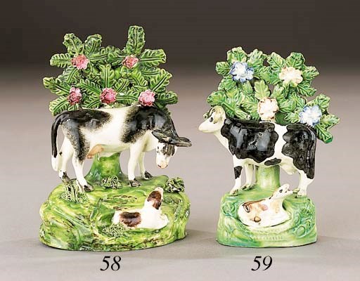 A creamware cow and calf group