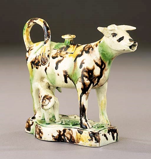 A creamware cow creamer and cover