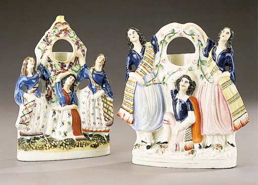 A watch holder group of the Three Graces