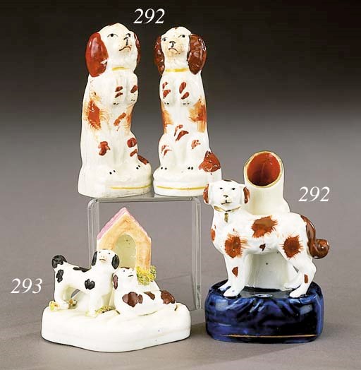 A pen-holder spill vase of a spaniel