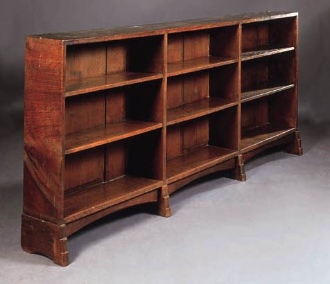 AN OAK OPEN BOOKCASE
