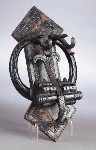 AN ENGLISH CAST IRON DOOR KNOCKER
CIRCA 1890