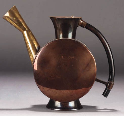A BENHAM AND FROUD COPPER AND BRASS EWER
CIRCA 1880