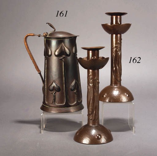 A KESWICK SCHOOL OF INDUSTRIAL ART COPPER JUG
CIRCA 1895