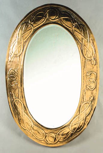 A SCOTTISH SCHOOL BRASS MIRROR
CIRCA 1905
