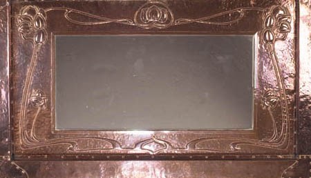 AN ENGLISH COPPER OVERMANTLE MIRROR FRAME
CIRCA 1890