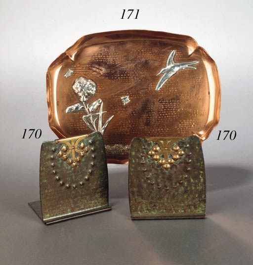 A PAIR OF ROYCROFT 'ETRUSCAN' COPPER AND BRASS BOOKENDS
CIRCA 1925