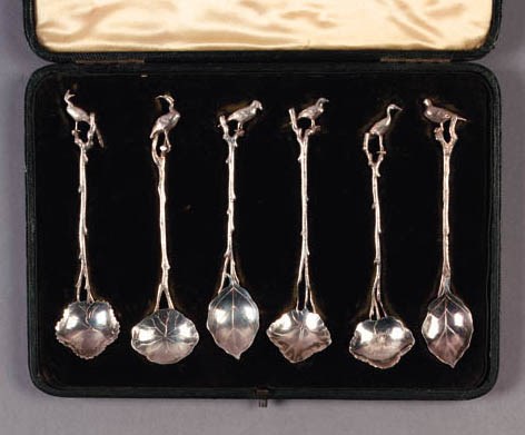 A SET OF SIX SILVER TEASPOONS
IMPORTED AND RETAILED BY LIBERTY & CO, IMPORT MARKS, LONDON 1898