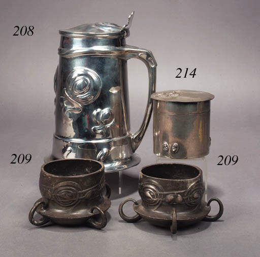 A LIBERTY ENGLISH PEWTER THREE PIECE TEASET
DESIGNED BY ARCHIBALD KNOX, CIRCA 1902-1905