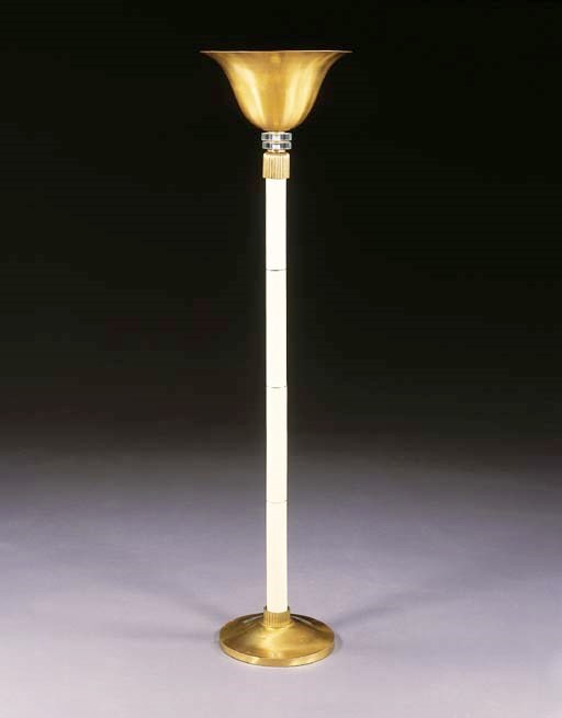 A GILT-METAL AND GLASS TORCHERE