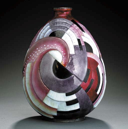 AN ENAMELED METAL VASE