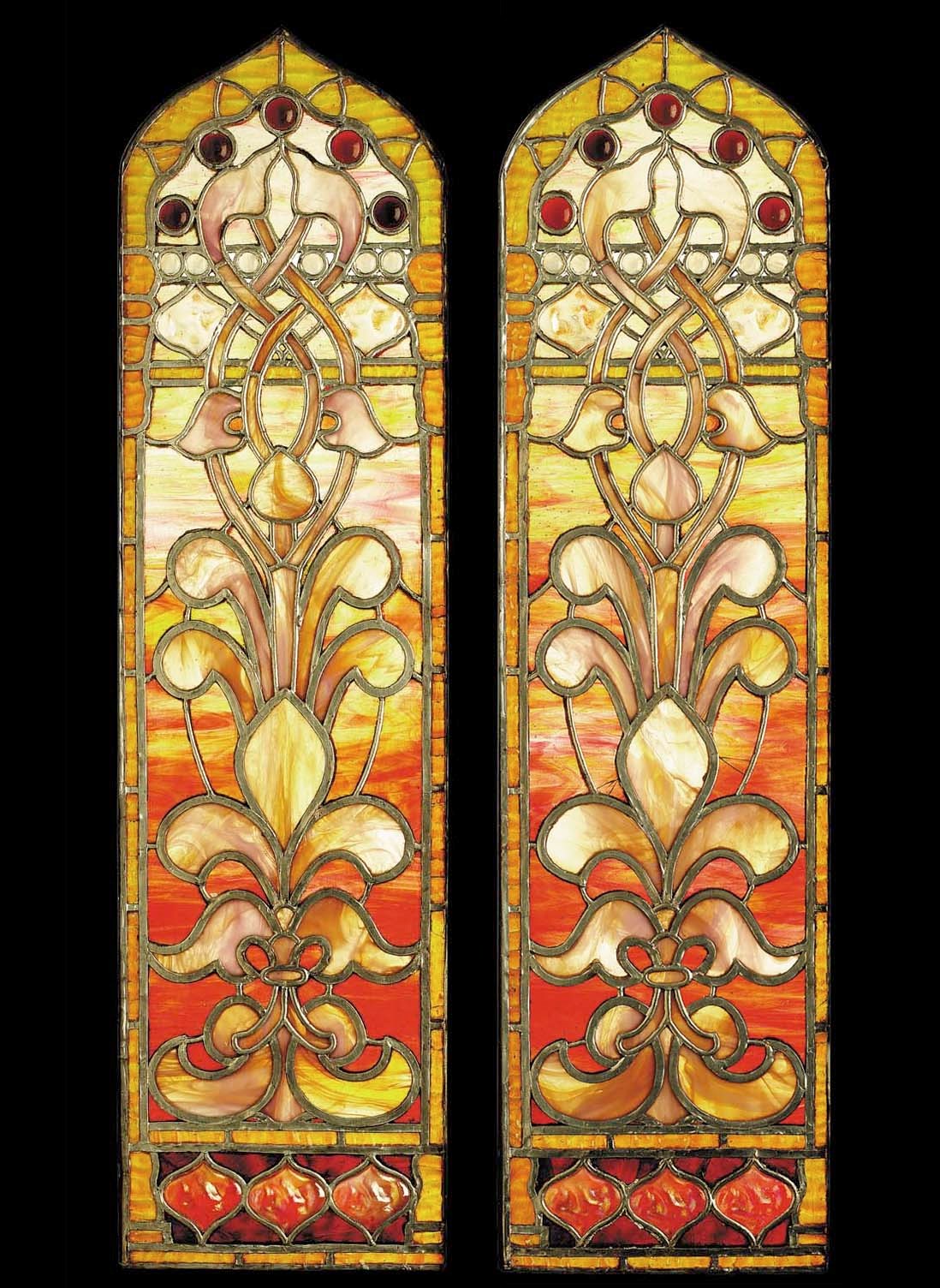 A PAIR OF LEADED GLASS WINDOWS