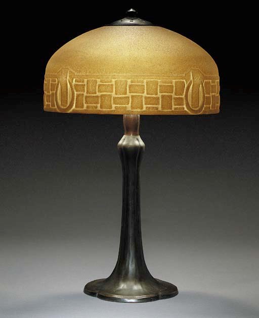 A CASED GLASS AND PATINATED-METAL TABLE LAMP