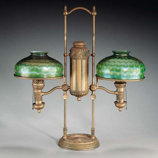 A FAVRILE GLASS AND GILT-BRONZE DOUBLE STUDENT LAMP