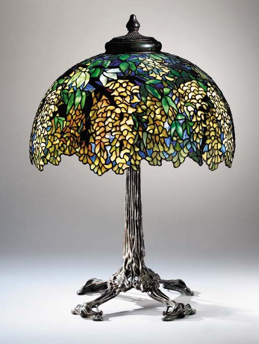 A 'LABURNUM' LEADED GLASS AND BRONZE TABLE LAMP