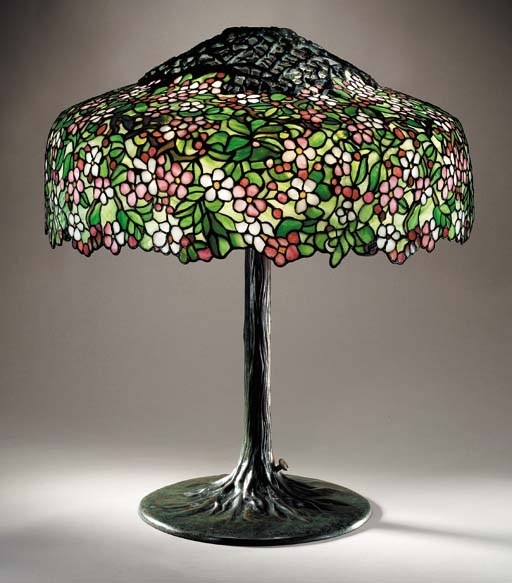 AN 'APPLE BLOSSOM' LEADED GLASS AND BRONZE TABLE LAMP