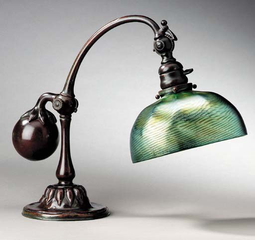 A FAVRILE GLASS AND BRONZE COUNTER BALANCE DESK LAMP