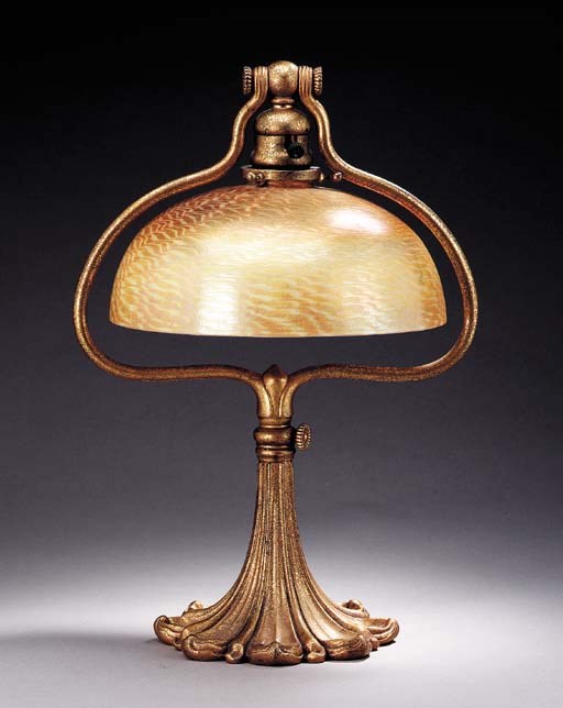A FAVRILE GLASS AND GILT-BRONZE TABLE LAMP
