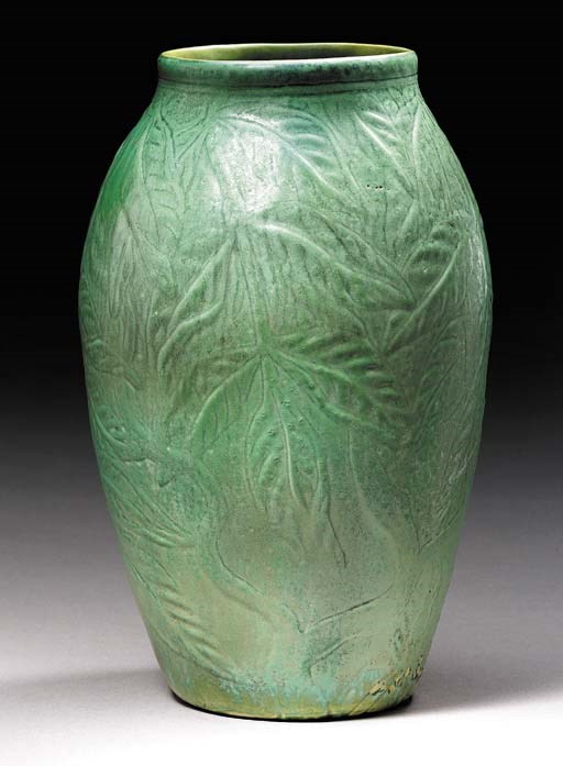 AN EARTHENWARE VASE