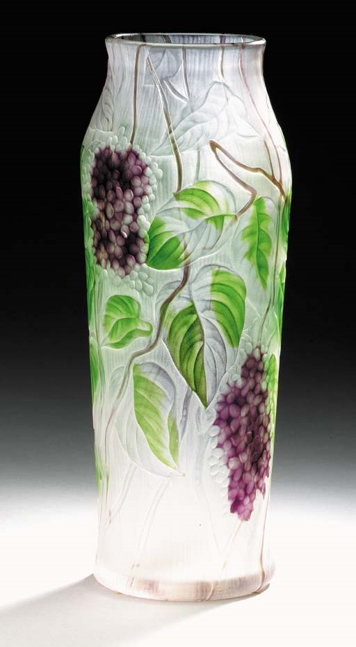 AN INTAGLIO-CARVED FAVRILE GLASS VASE