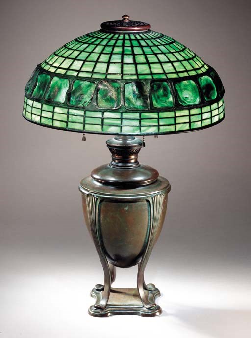 A 'BANDED TURTLEBACK TILE' LEADED GLASS AND BRONZE TABLE LAMP
